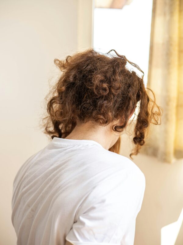 Man with the back of his head showing.