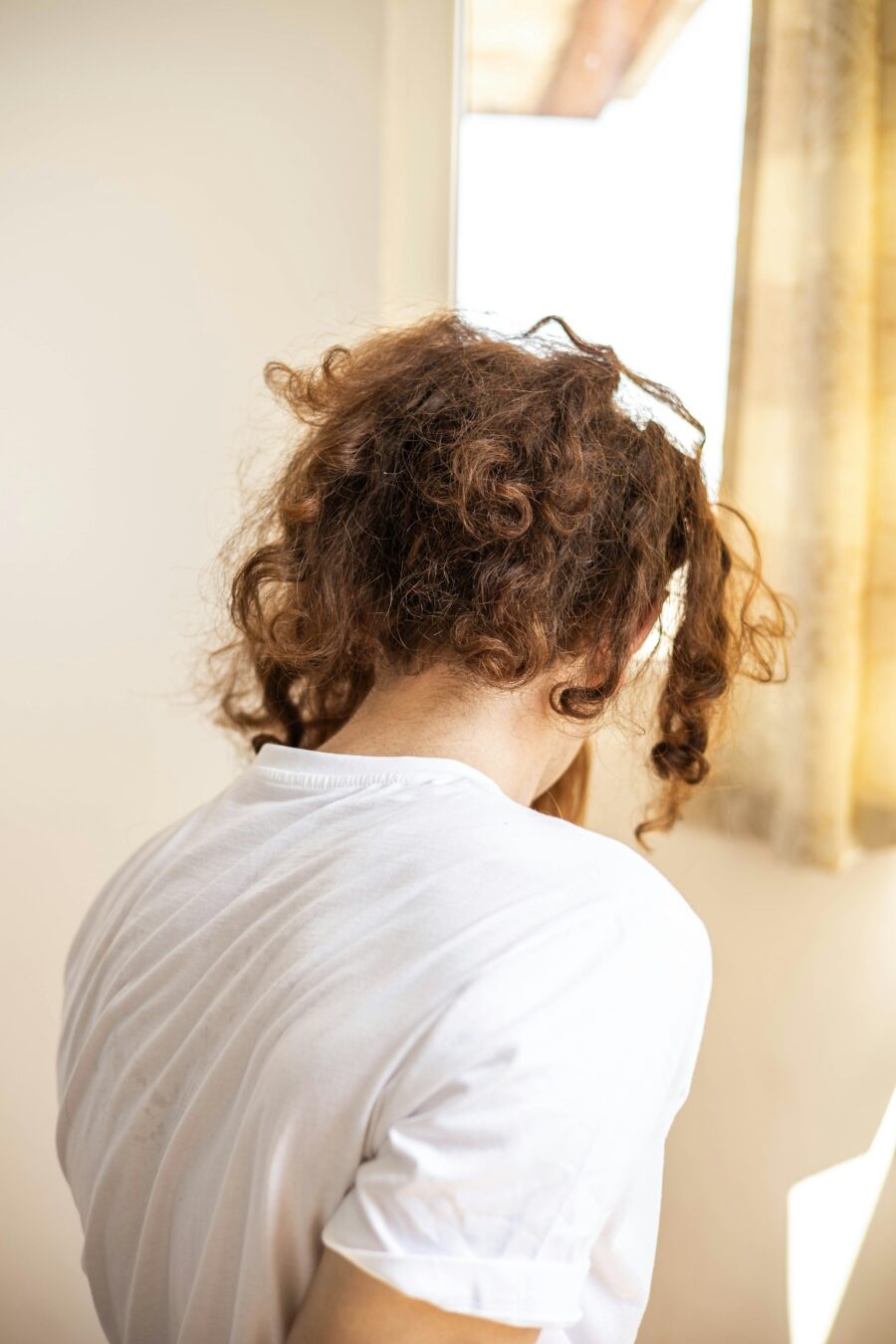 Man with the back of his head showing.