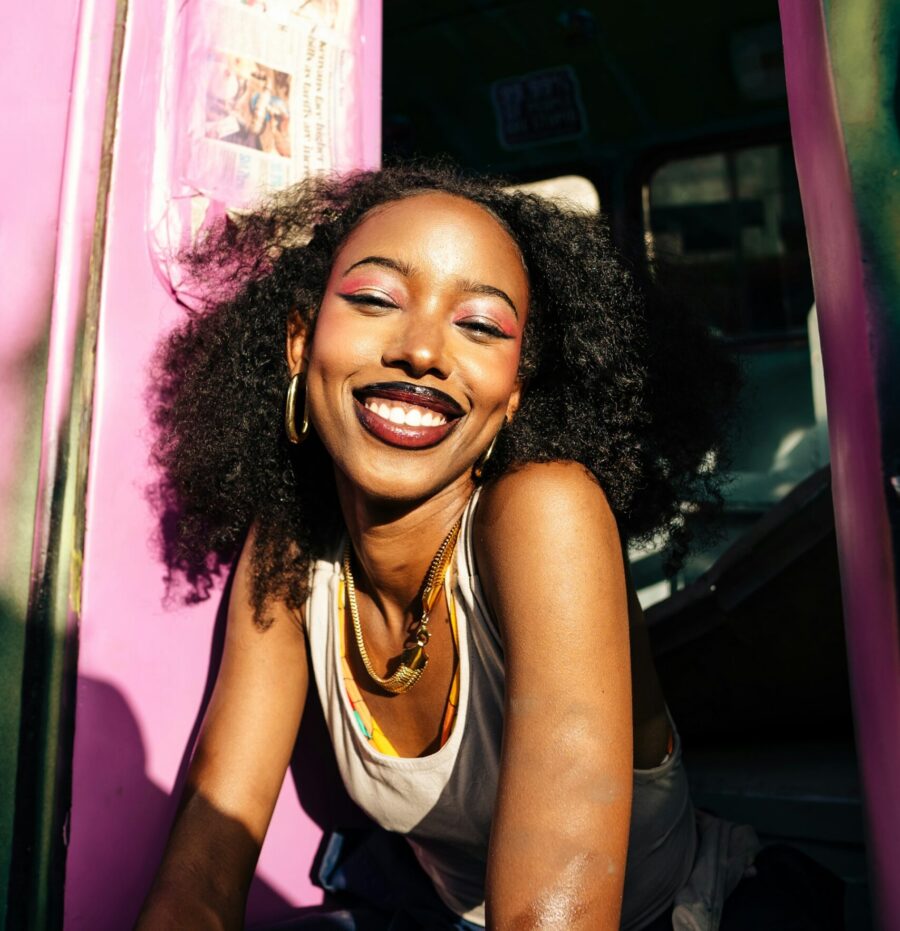 Woman smiling with curly hair