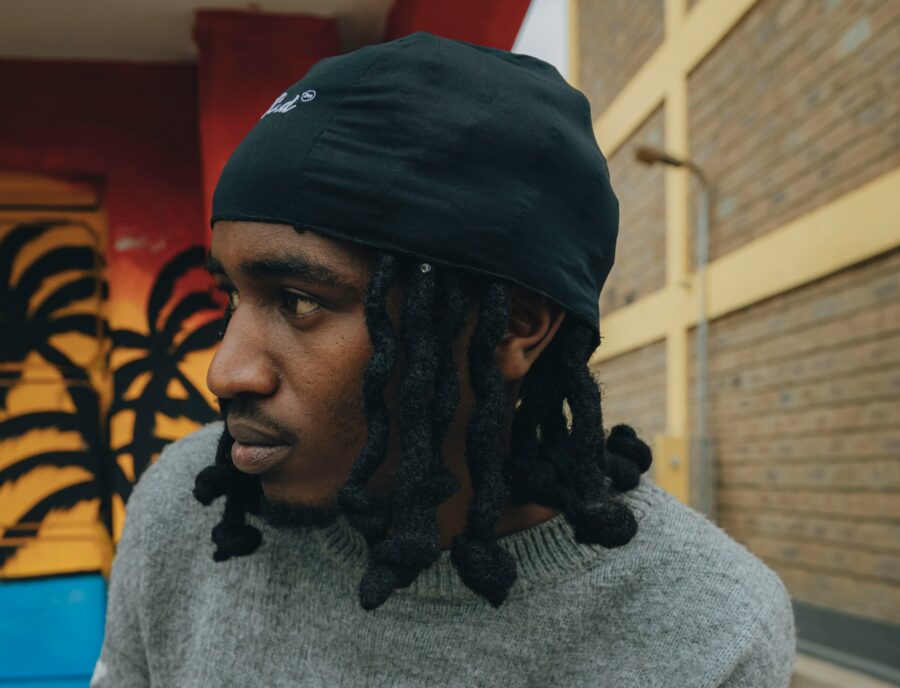 Man wearing his natural curly hair