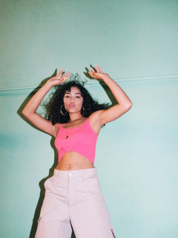 Woman dancing with curly hair