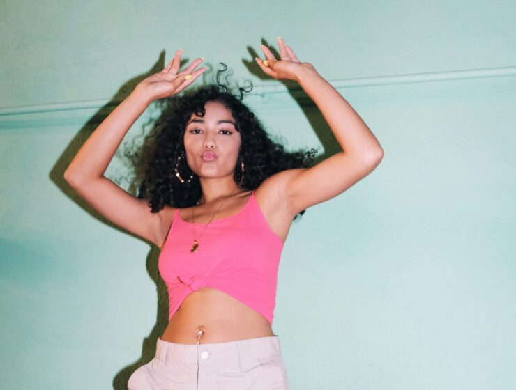 Woman dancing with curly hair