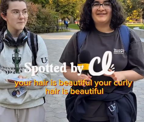 Two women with curly hair being interviewed by Curly Lifestyles