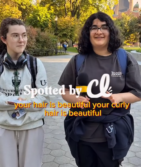 Two women with curly hair being interviewed by Curly Lifestyles